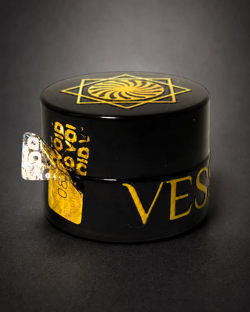 VESSENSE LE BAUME jar with the control seal partially removed revealing the VOID layer